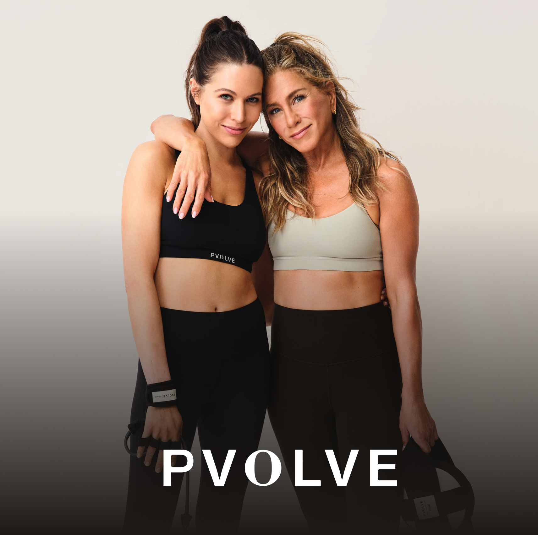 jenifer-aniston-hugging-pvolve-woman