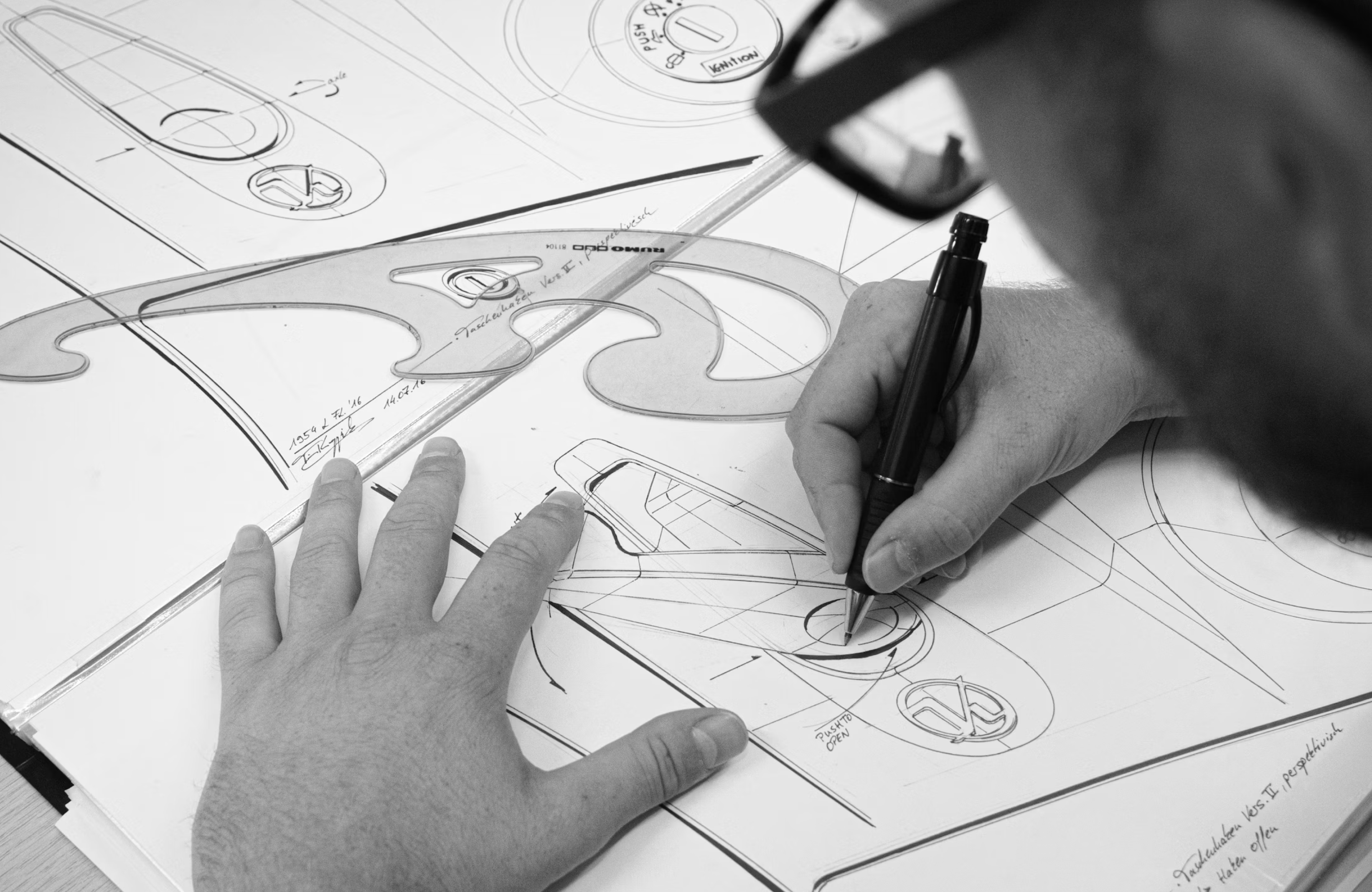 man-drawing-blueprint